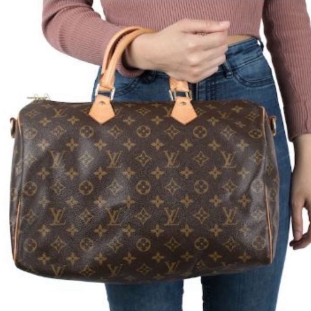 100% Authentic Louis Vuitton Monogram
Speedy 30
Hand Bag M41526 LV E2562...